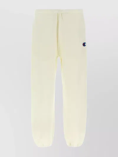 Undercover Champion Joggers Featuring Elastic Waistband In White