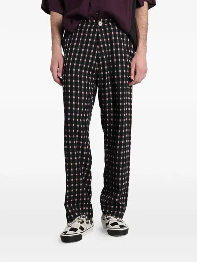 Undercover Check-pattern Logo-patch Trousers In Black