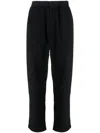 UNDERCOVER ELASTICATED-WAIST TAPERED TROUSERS