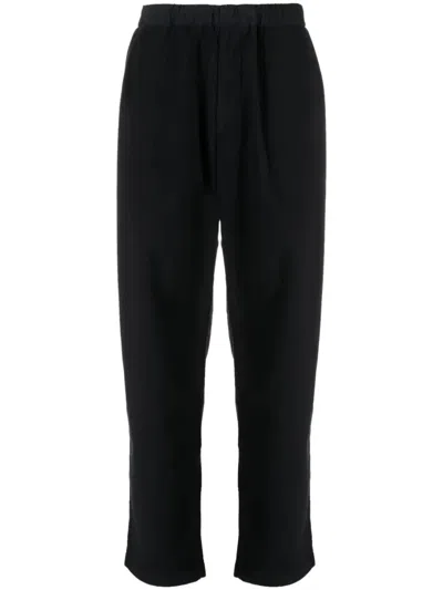 Undercover Elasticated-waist Tapered Trousers In Black
