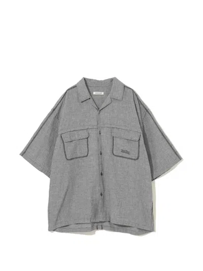 Undercover Houndstooth-pattern Patch-pocket Shirt In Black