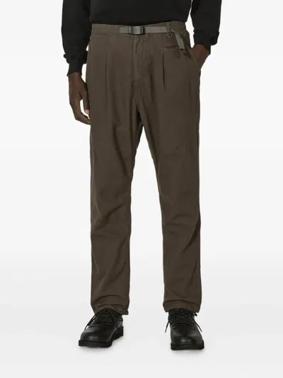 Undercover Pleated Belted Trousers In Brown