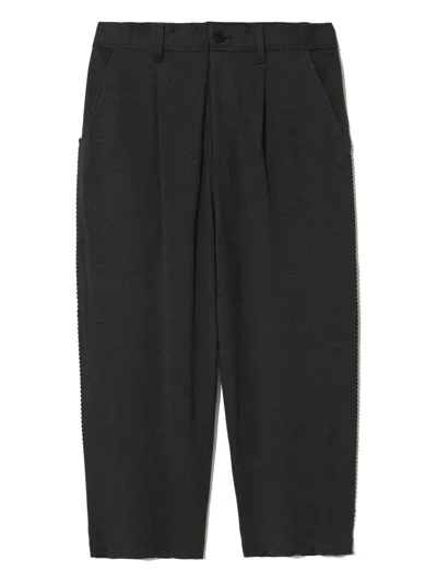 Undercover Pleated Tapered Trousers In Black