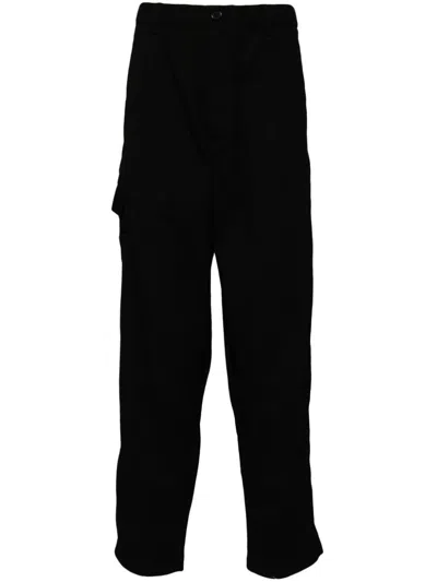Undercover Pockets Tapered Trousers In Black