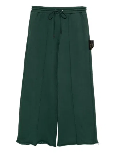 Undercover Slogan-patch Trousers In Green
