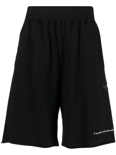 Undercover Slogan-print Cotton Track Shorts In Schwarz
