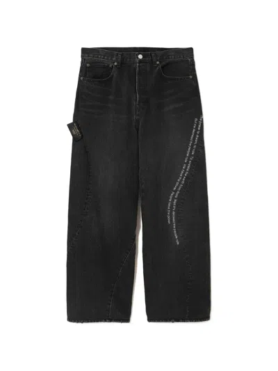 Undercover Slogan-print Panelled Jeans In Black