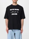 Undercover Graphic Print Black T-shirt With Exposed-seam Detailing And Logo Patch