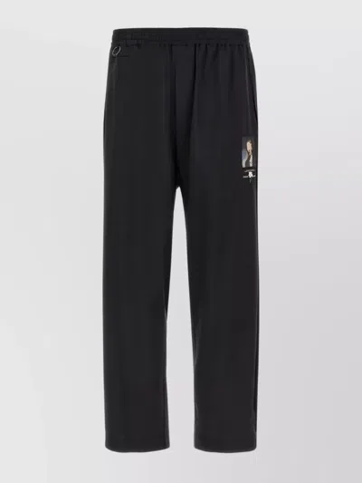 UNDERCOVER TROUSERS GRAPHIC PRINT ELASTIC WAISTBAND