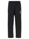 Undercover Trousers Graphic Print Elastic Waistband In Black