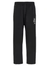 Undercover Trousers Graphic Print Elastic Waistband In Black