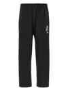 Undercover Trousers Graphic Print Elastic Waistband In Black