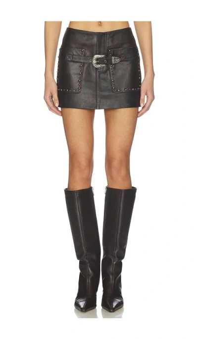 Understated Leather Low Rise Buckle Skirt In Black