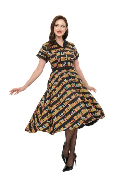 Unique Vintage Collared Short Sleeved Belted Alexis Swing Dress In Black Bookshelf Print