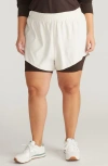 Universal Standard Active Shorts In White