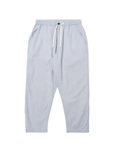 Universal Works Drawstring Trousers In Blue