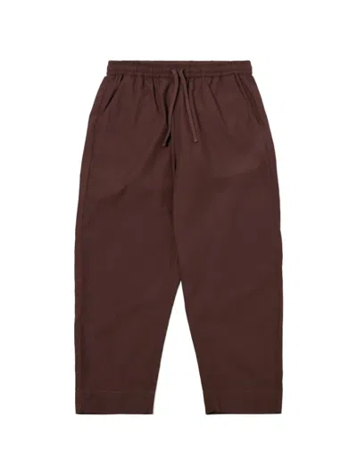 Universal Works Drawstring Trousers In Brown