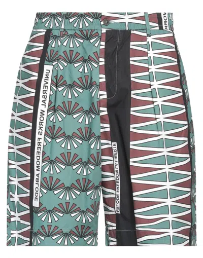 Universal Works Man Shorts & Bermuda Shorts Green Size 34 Cotton