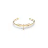 Unode50 Dragonfly Topaz Adjustable Bracelet In Gold