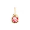 Unode50 Circular Metal Alloy Charm With Faceted Stone In Gold