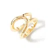 Unode50 Curvilinear Design Brass Clad Ring In Gold