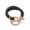 Unode50 Gold Twelve-strap Glow Bracelet In Brown