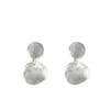 Unode50 Metal Clad Two Uneven Round Earrings In Silver
