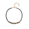 Unode50 Short Leather Necklace With 5 Small 18k Gold Plated Metal Alloy Necklace Central Links With Topaz In Black