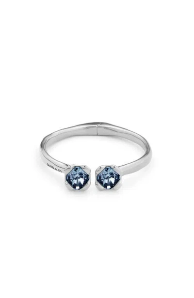 Unode50 Sterling Silver-plated Bangle Bracelet With Inner Spring And Two Blue Crystals