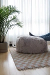 Urban Outfitters Aspyn Faux Fur Shag Ottoman In Grey