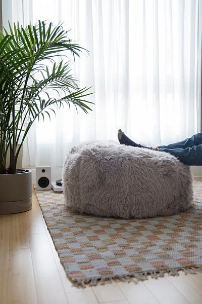 Urban Outfitters Aspyn Faux Fur Shag Ottoman In Grey