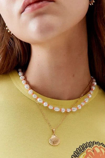 Urban Outfitters Beachy Neon Pearl & Charm Layering Necklace Set In Orange Seashell, Women's At