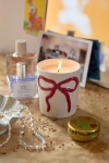 Urban Outfitters Bow 7 oz Candle In Black Noir Spice At  In Red