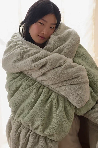 Urban Outfitters Cinched Marshmallow Cloud Fleece Throw Blanket In Sage At  In Green