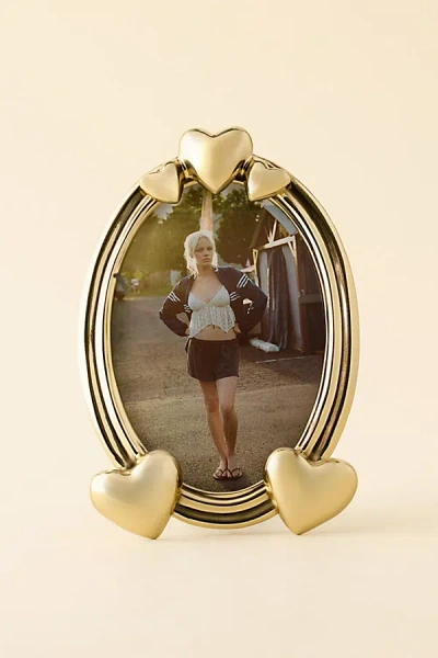 Urban Outfitters Golden Hearts 7" X 5" Oval Picture Frame In Gold At