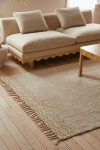 URBAN OUTFITTERS JENNER WOVEN SHAGGY RUG IN WHITE AT URBAN OUTFITTERS