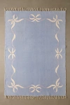 Urban Outfitters Lacey Bows Unbrushed Printed Rug In Blue At