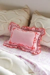 Urban Outfitters Lacey Bows Velvet Ruffle Bolster Pillow In Pink At