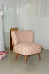 URBAN OUTFITTERS LOTTIE ARMLESS CHAIR IN PINK FLORAL AT URBAN OUTFITTERS