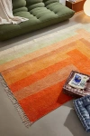 URBAN OUTFITTERS MAE PATCHWORK DIGITAL PRINTED CHENILLE RUG IN RED AT URBAN OUTFITTERS