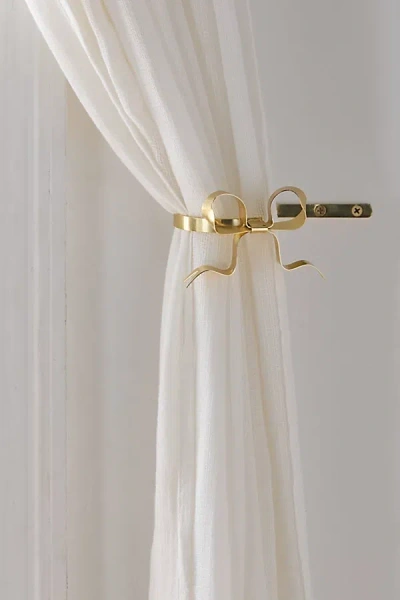 Urban Outfitters Marina Bow Curtain Tie-back Set In Brass At  In White