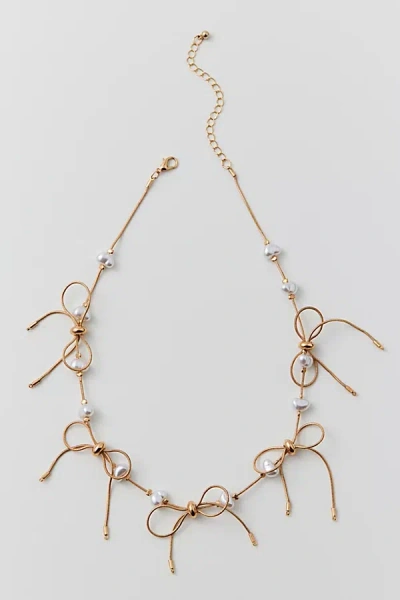 Urban Outfitters Mini Bow Pearl Necklace In Gold, Women's At