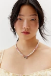 URBAN OUTFITTERS PEARL BEADED BOW CHARM NECKLACE IN PEARL, WOMEN'S AT URBAN OUTFITTERS