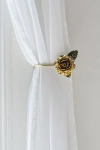 URBAN OUTFITTERS ROSETTE CURTAIN TIE-BACK SET IN GOLD AT URBAN OUTFITTERS