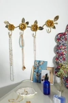URBAN OUTFITTERS ROSETTE JEWELRY HANGER IN GOLD AT URBAN OUTFITTERS
