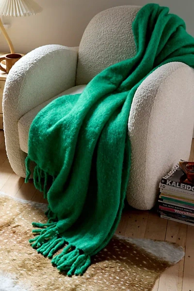 Urban Outfitters Solid Faux Fur Throw Blanket In Green At