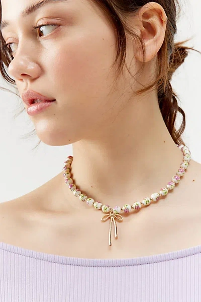 Urban Outfitters Vera Floral Beaded Bow Necklace In Floral Beaded, Women's At  In Gold