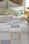 URBAN RENEWAL REMNANTS HANKIE QUILTED THROW BLANKET IN BLEACHED OUT AT URBAN OUTFITTERS