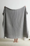 URBAN RENEWAL REMNANTS RECYCLED WAFFLE THROW BLANKET IN WHITE MELANGE AT URBAN OUTFITTERS