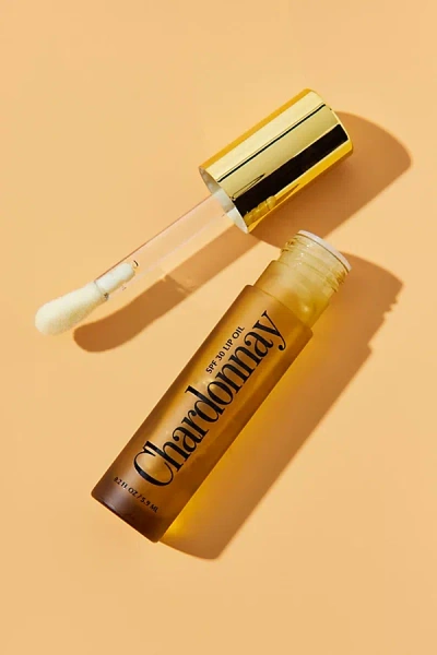Vacation Chardonnay Spf 30 Lip Oil In Gold At Urban Outfitters